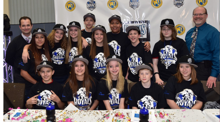 Grace Lutheran studs pose together for a photo at signing day