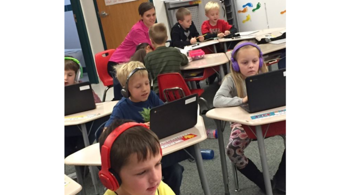 Students at Gem Prep work on their laptops