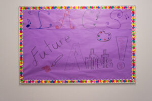 A poster reads "IACS, Future Artists"