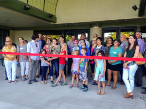 Sage students and families prepare to cut the ribbon on Sages new unified building