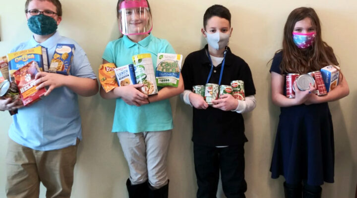 Students at Mosaic hold snacks