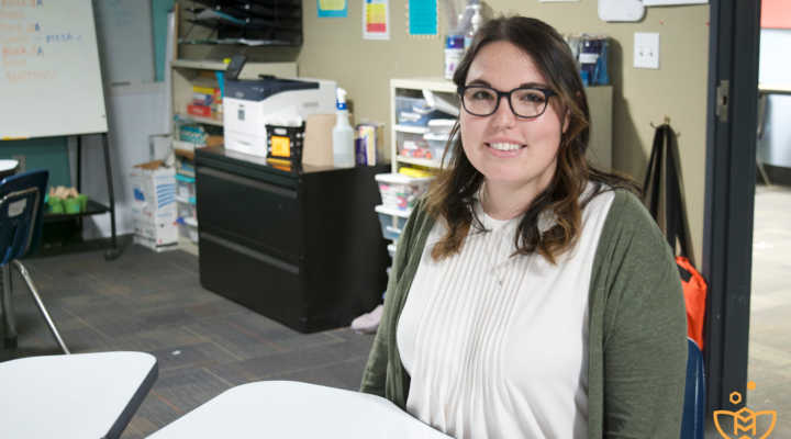 Maura sits in her 6th grade classroom