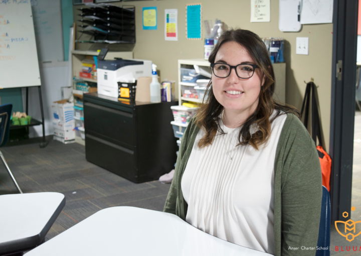 Maura sits in her 6th grade classroom