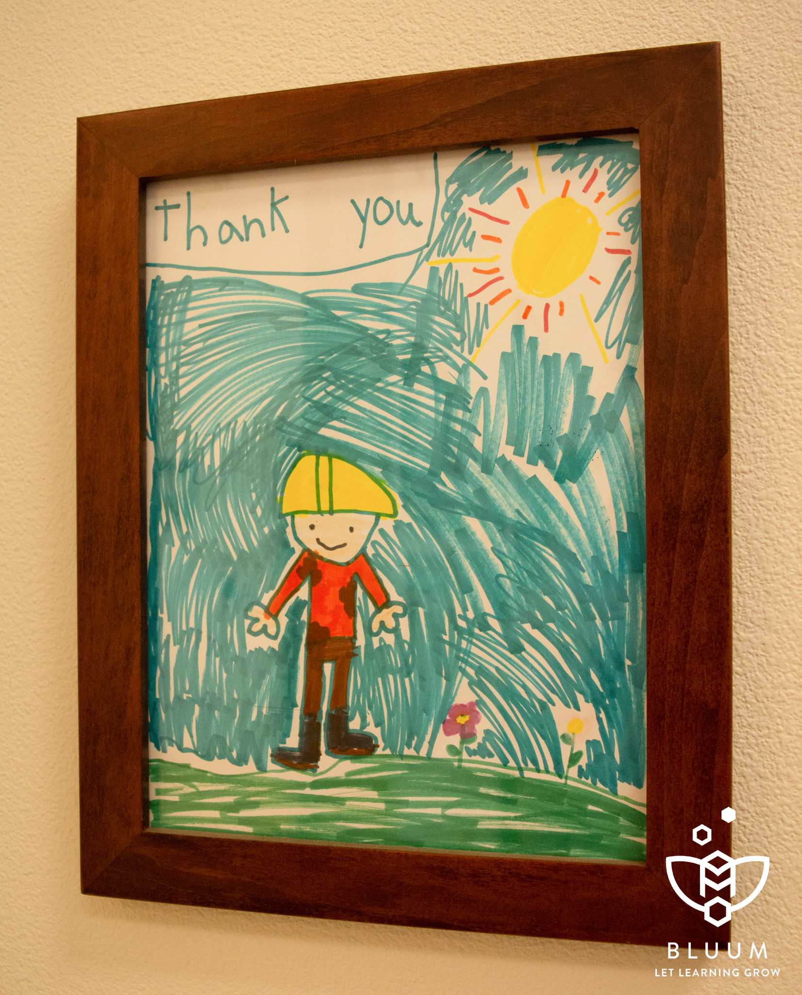 A student artwork hung up as a thank you at R&M Steel.