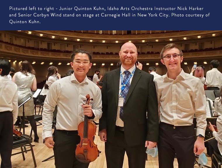 IACS students stand on stage at Carnegie Hall with their instructor