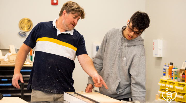 Elevate Construction Teacher with Student in the Shop