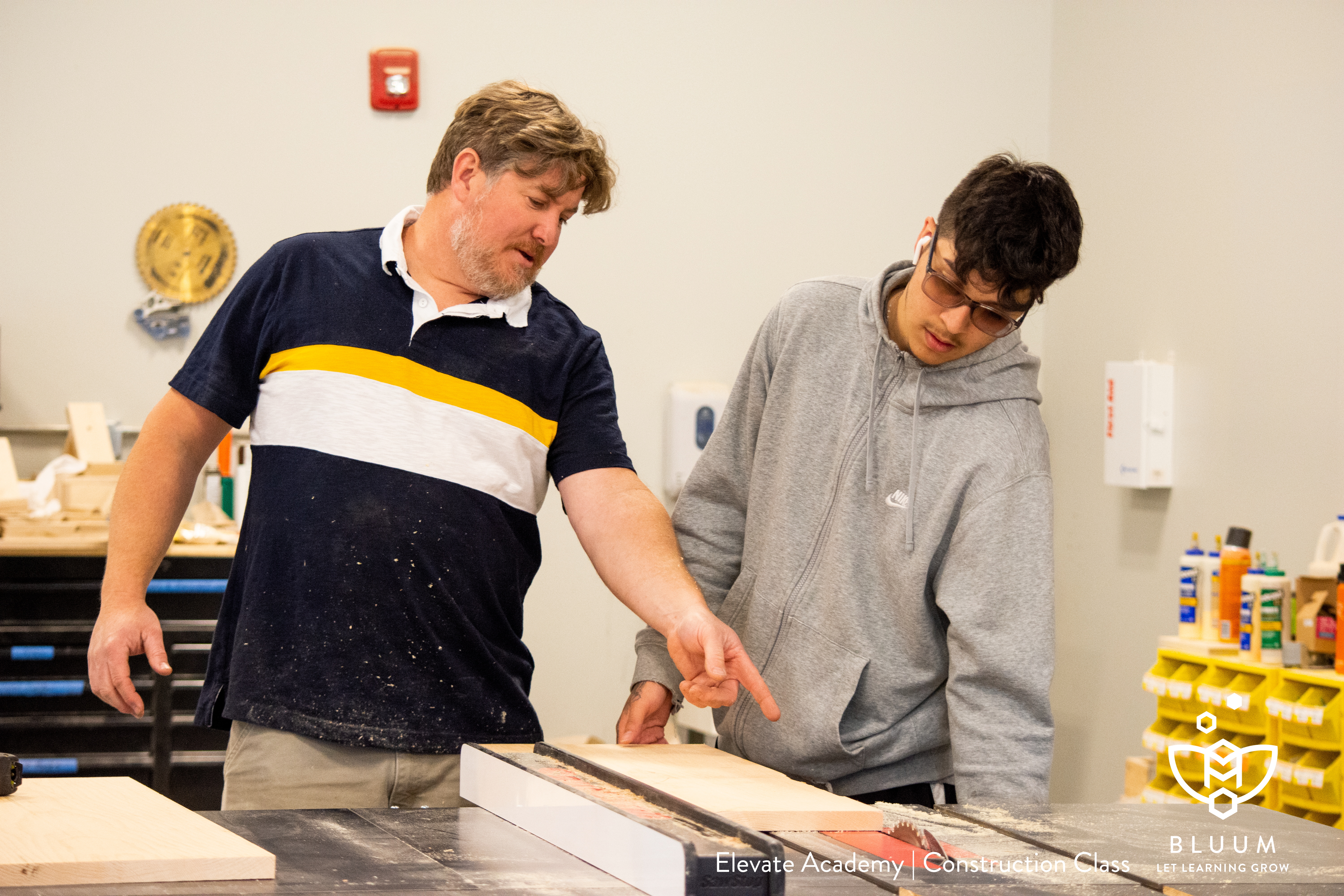 Elevate Construction Teacher with Student in the Shop